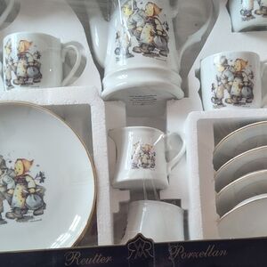 A New In The Box M. J. HUMMEL Tea Set. Service For 4